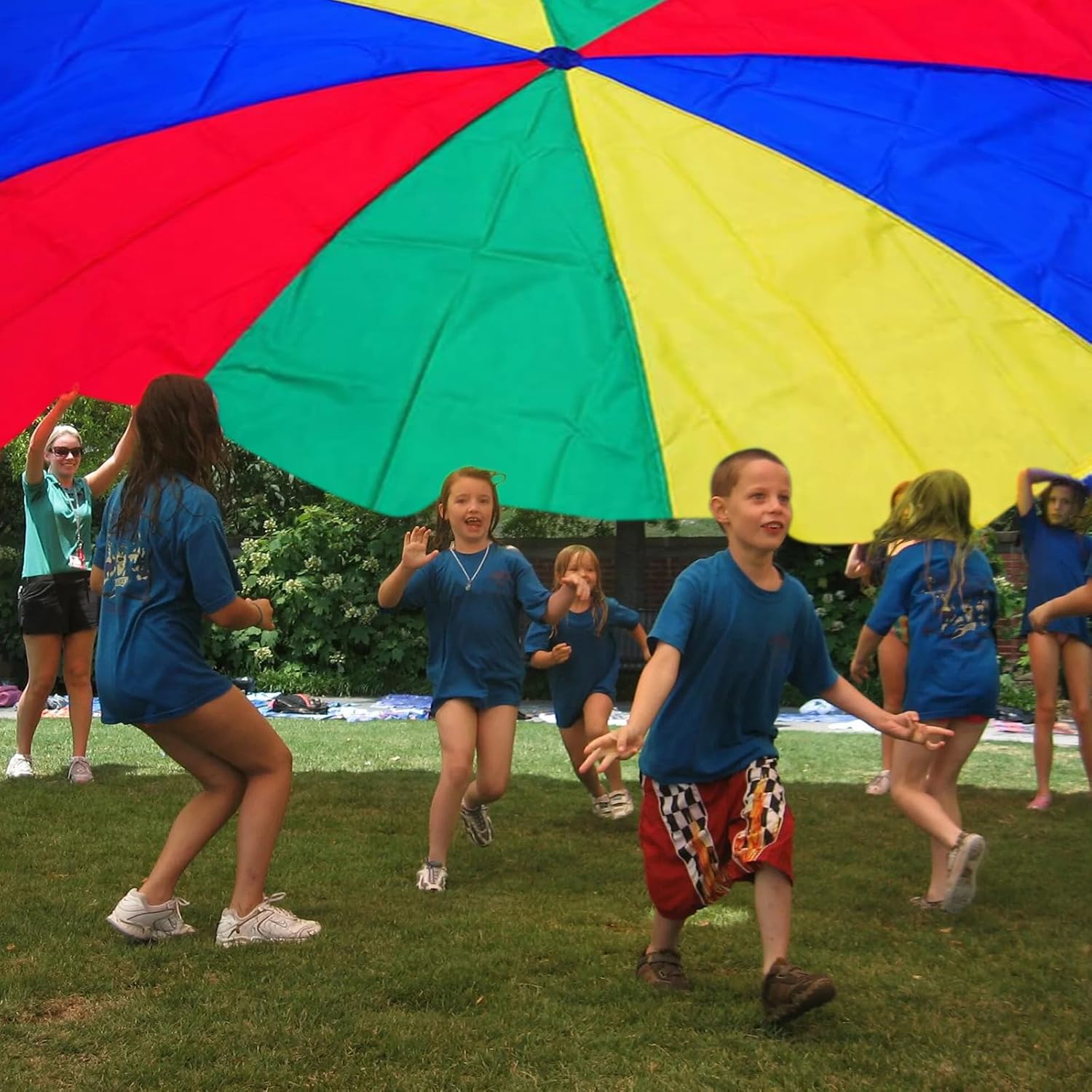 rainbow tarp Rainbow Parachute – Lawn Game Rentals – Rockin' Party Rentals – Rockin' Party Rentals